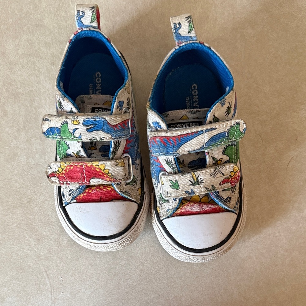 Converse Kids White Canvas Dinosaur Slip-On Sneakers with Red Blue Green Accents